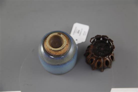 A Chinese Jun-type cup, Qing dynasty, height 7.5cm, carved rosewood lotus shaped stand